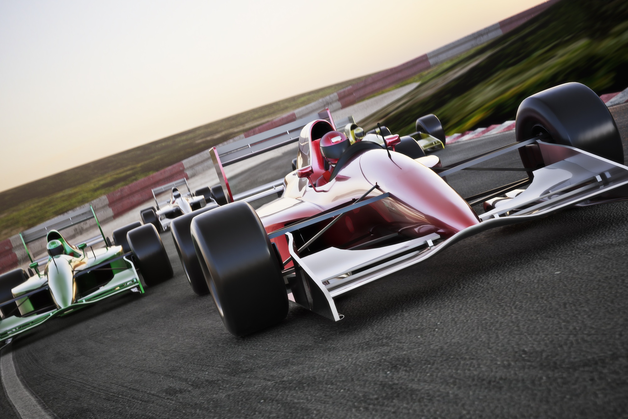 Red race car close up front view on a track leading the pack with motion Blur